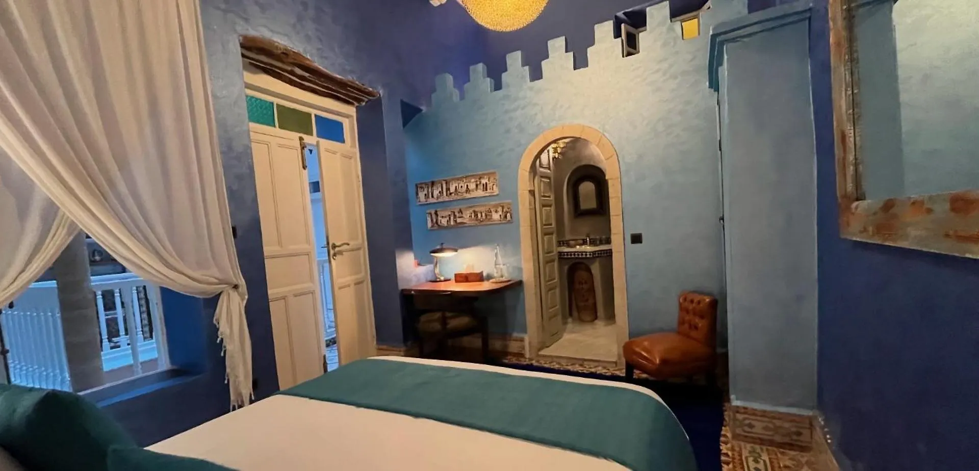 אסאוירה Riad Malaika